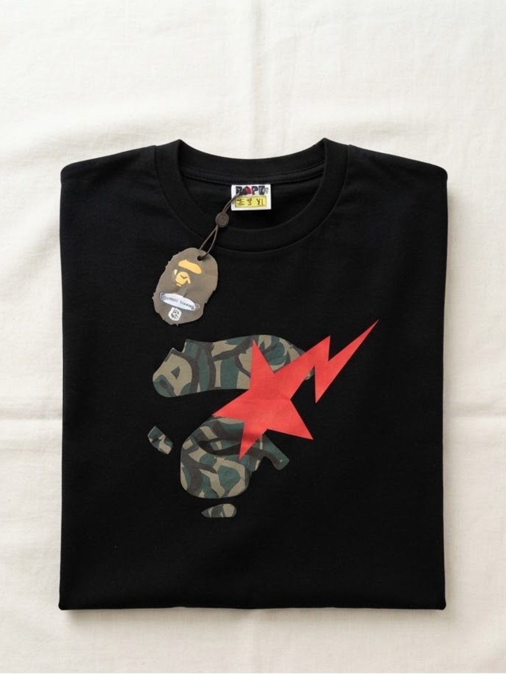 Black Graphic Tee with Red Star Lightning and Camo Ape Motif